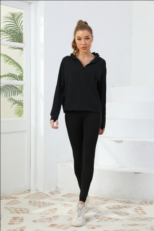 Black women’s half-zip cotton hoodie sweatshirt with drawstring hood, relaxed fit