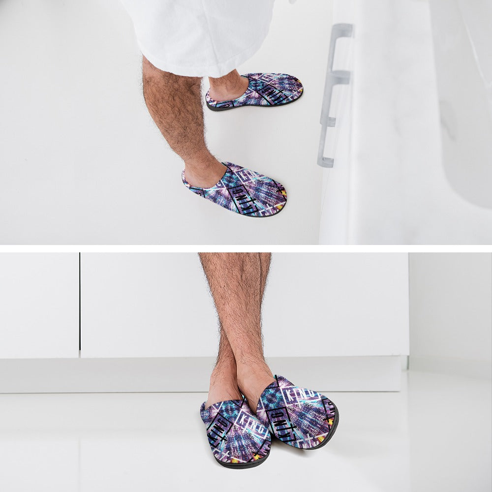 On-foot view of purple-blue printed slip-on slippers with black textured sole
