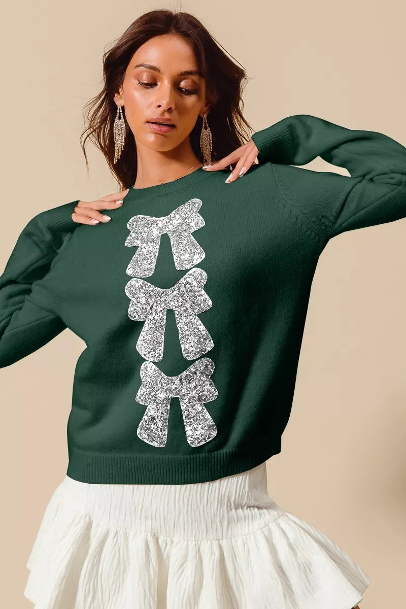 Hunter green Christmas sweater with silver sequin bow-ribbon embellishment