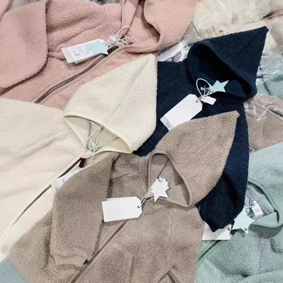 Kids fleece zip-up jackets assortment, beige and cream tones with hoods and front zips