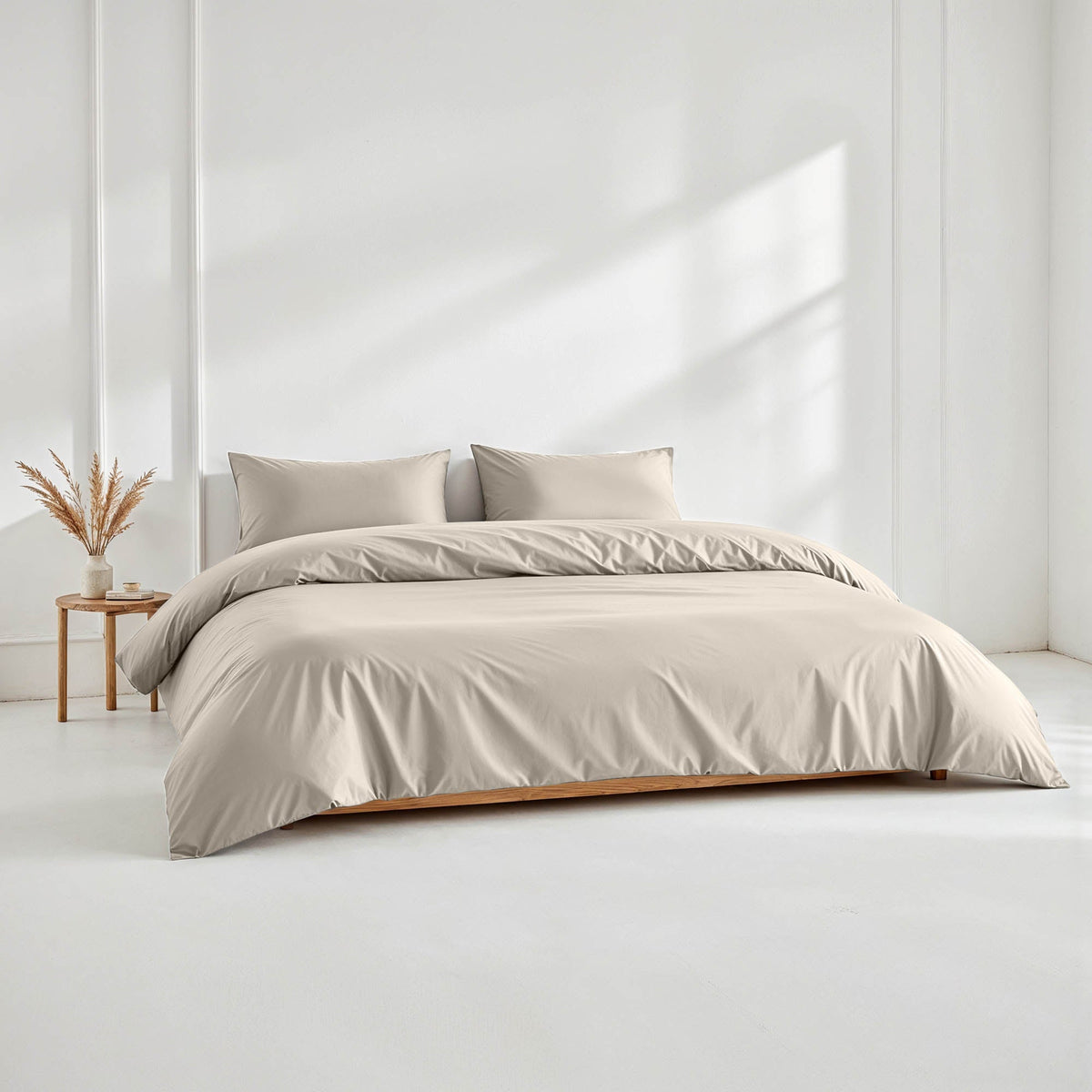 Solid light gray duvet cover with matching pillow shams
