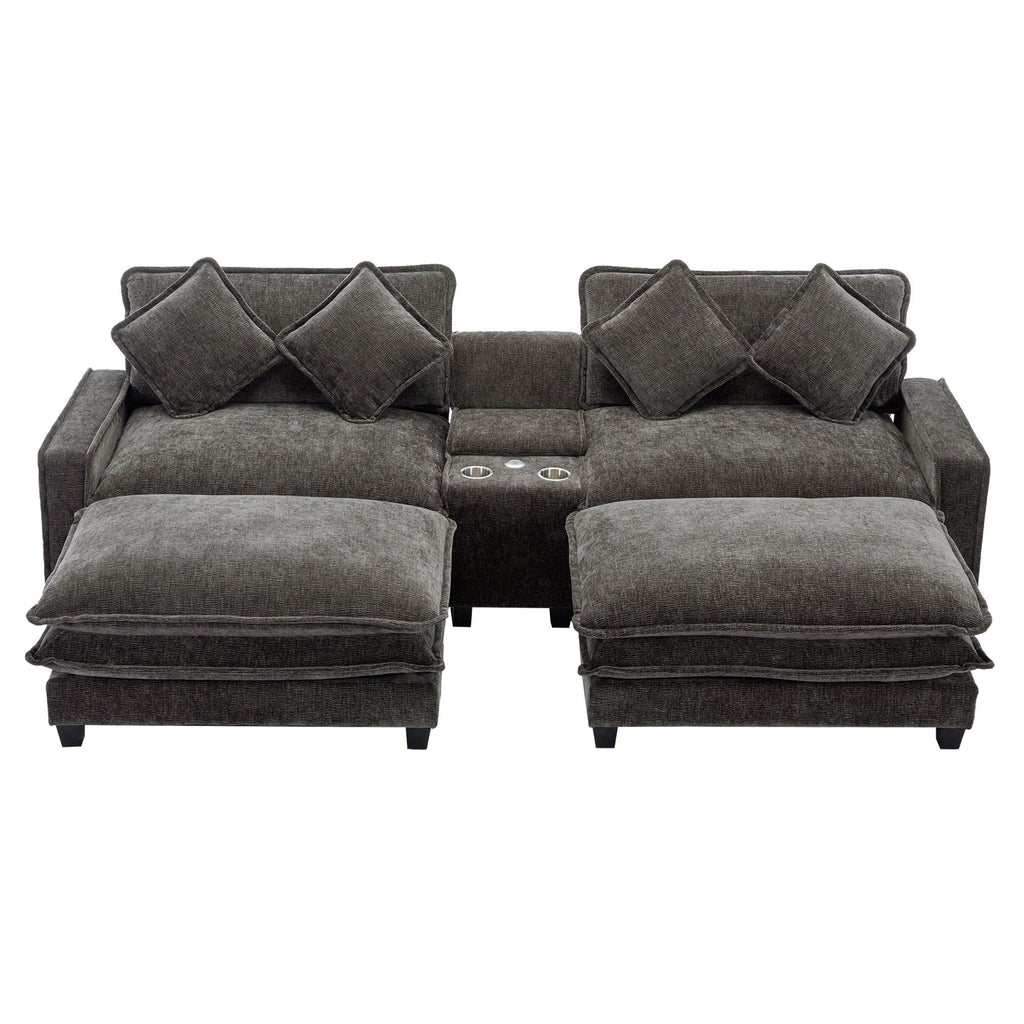 Dark gray sectional sofa with removable ottomans and four throw pillows