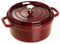 Staub enameled cast iron Dutch oven with red lid, stainless knob and side handles
