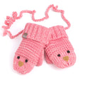 Knit chick baby mittens in pink with cord ties and stitched face design