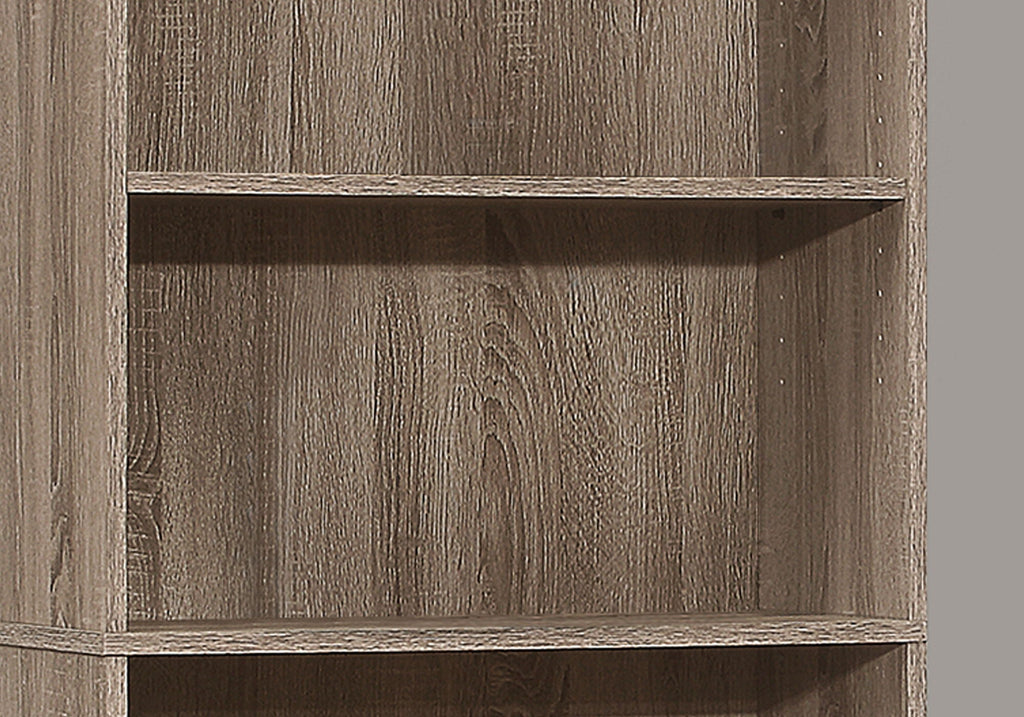 Wood-grain shelf surface from a dark brown 6-tier bookcase