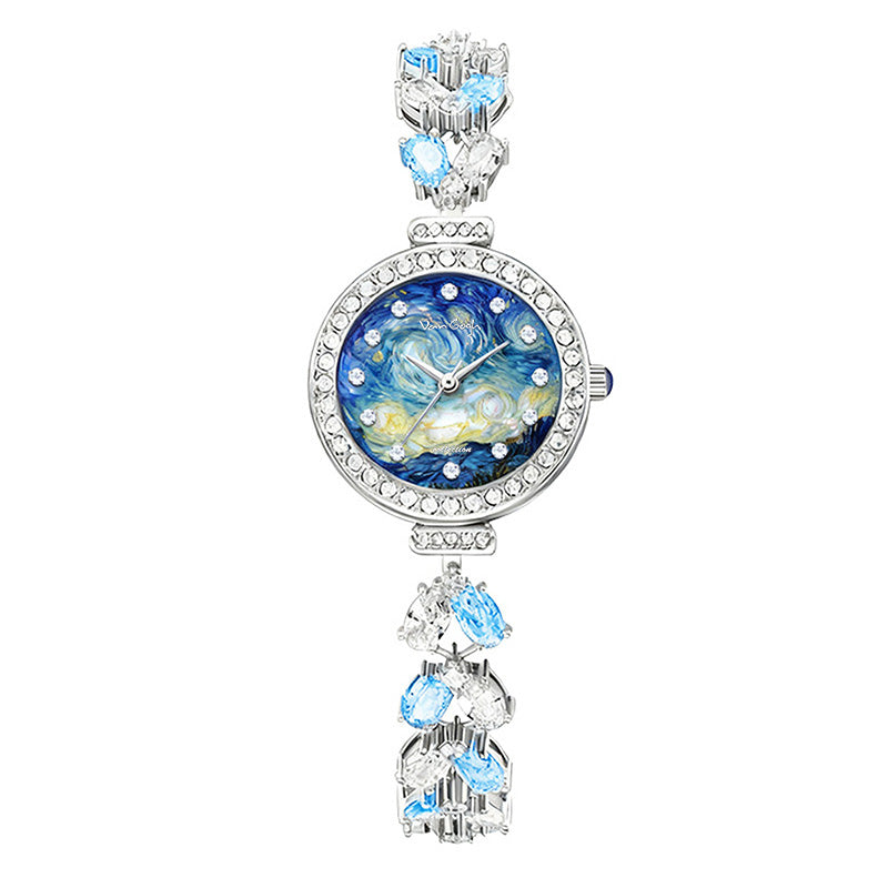 Blue floral dial wristwatch with rhinestone bezel and silver link bracelet