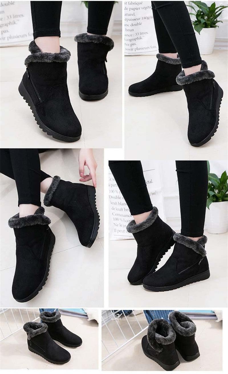Women’s winter ankle boots in black suede with faux fur trim and side zipper, worn on legs