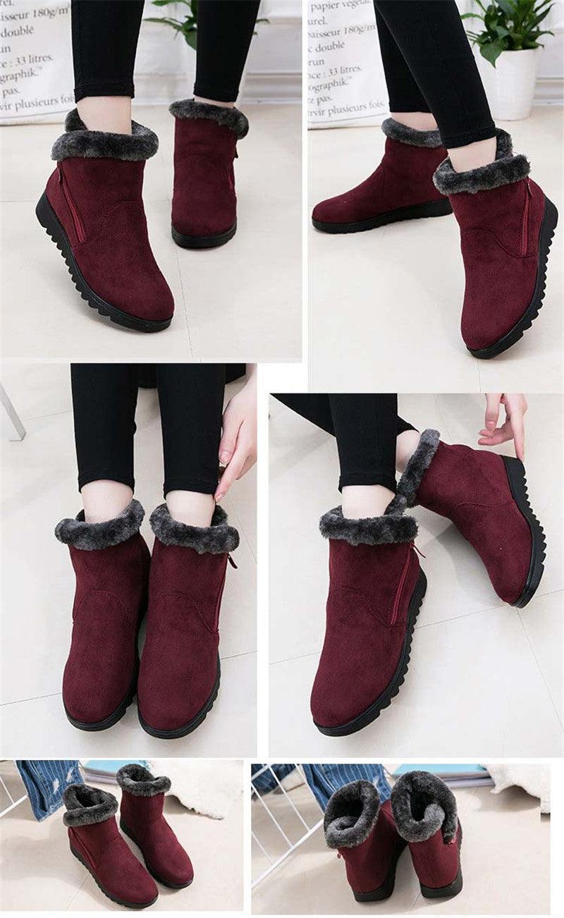 Women’s winter ankle boots in burgundy with faux fur trim and side zipper, worn on legs