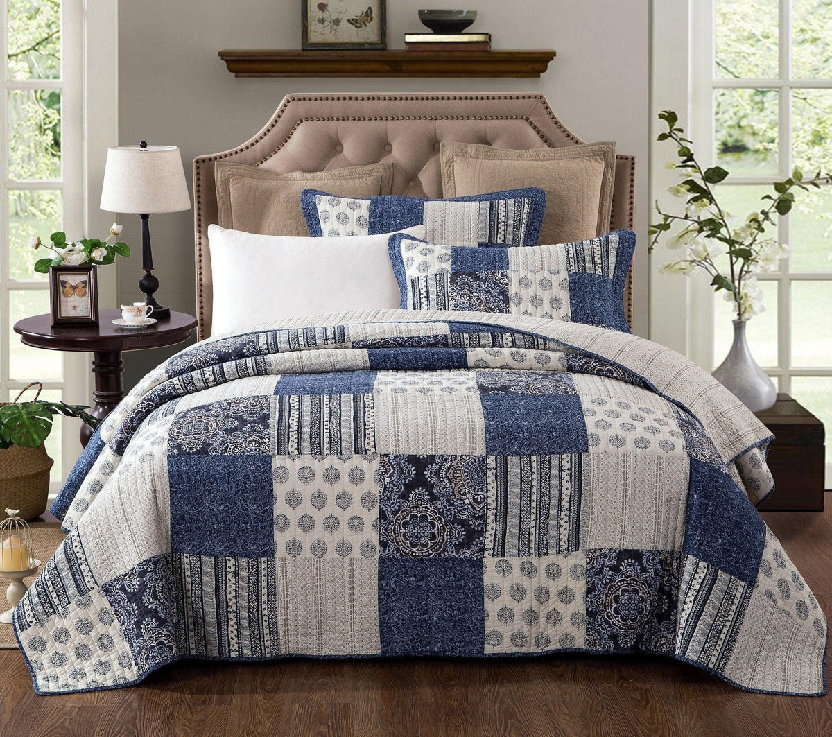 Denim blue patchwork cotton quilt set with geometric patterns and matching shams