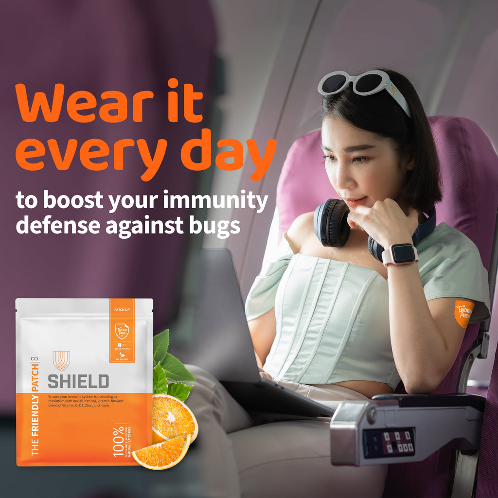 Woman wearing an orange immunity patch on her arm with patch pouch shown