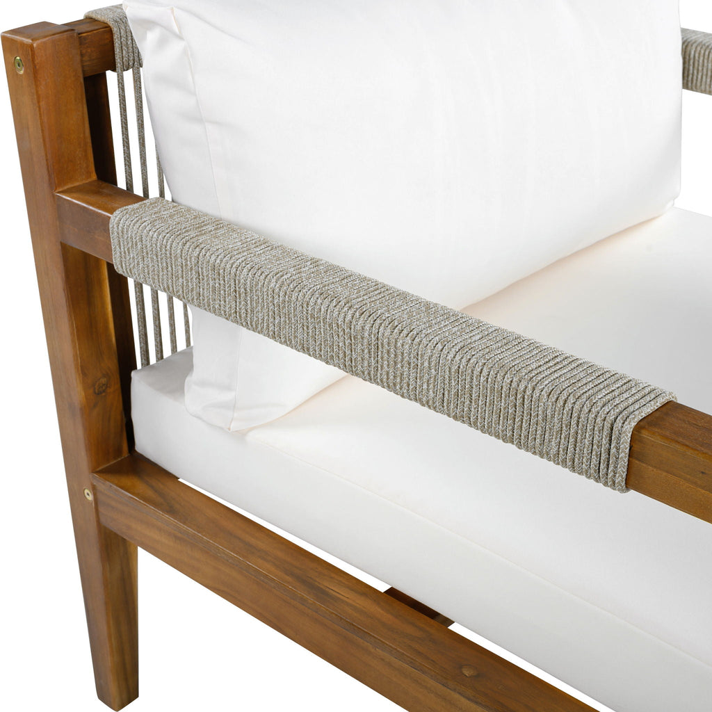 Acacia armchair with textured gray armrest cushion and white seat cushion