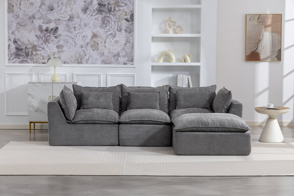 Gray fabric sectional sofa with wide chaise and stacked back cushions