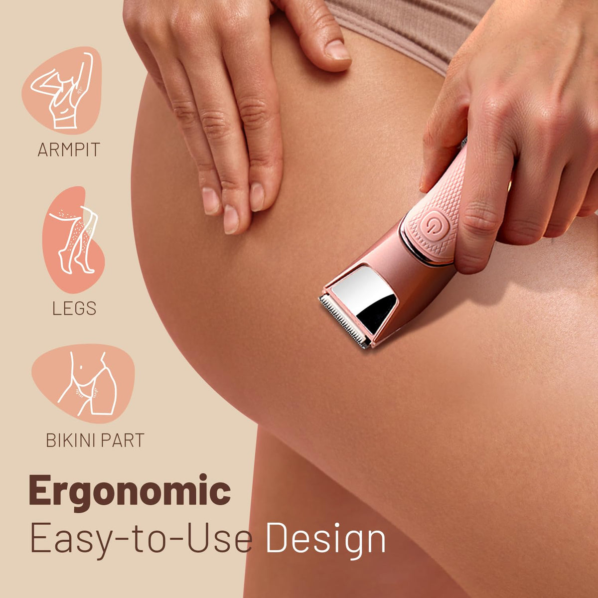Pink electric body trimmer held in hand for grooming bikini and legs