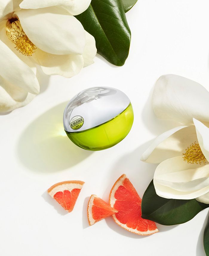 DKNY Be Delicious eau de parfum bottle with green glass body and silver lid