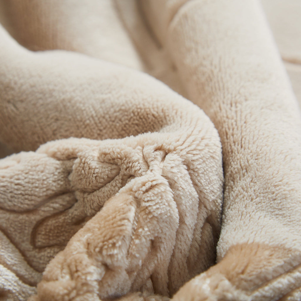 Beige sherpa throw blanket knot detail in plush embossed fabric