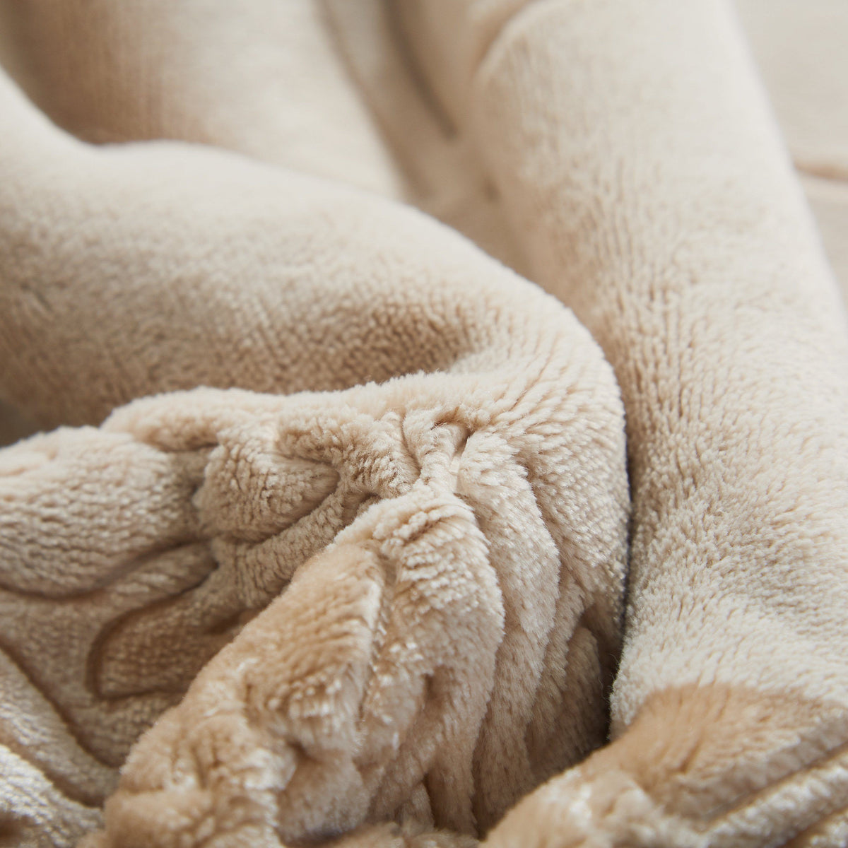 Beige sherpa throw blanket knot detail in plush embossed fabric