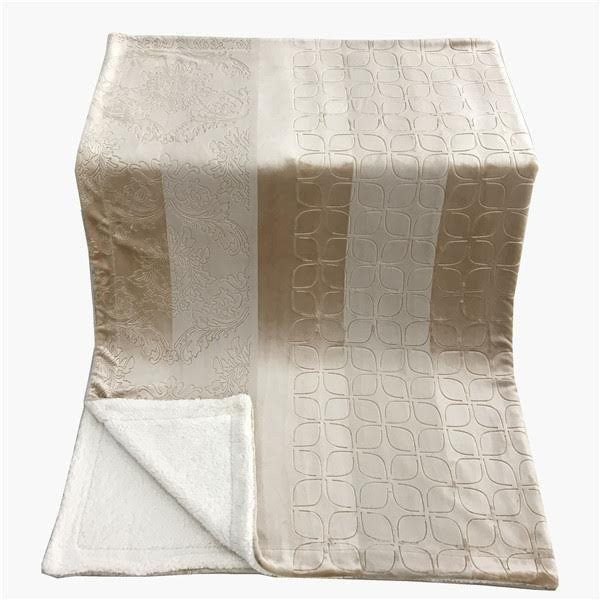 Beige sherpa throw blanket, embossed bubbly texture with solid sherpa side