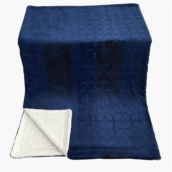 Tache solid embossed night blue throw blanket with white sherpa corner panel