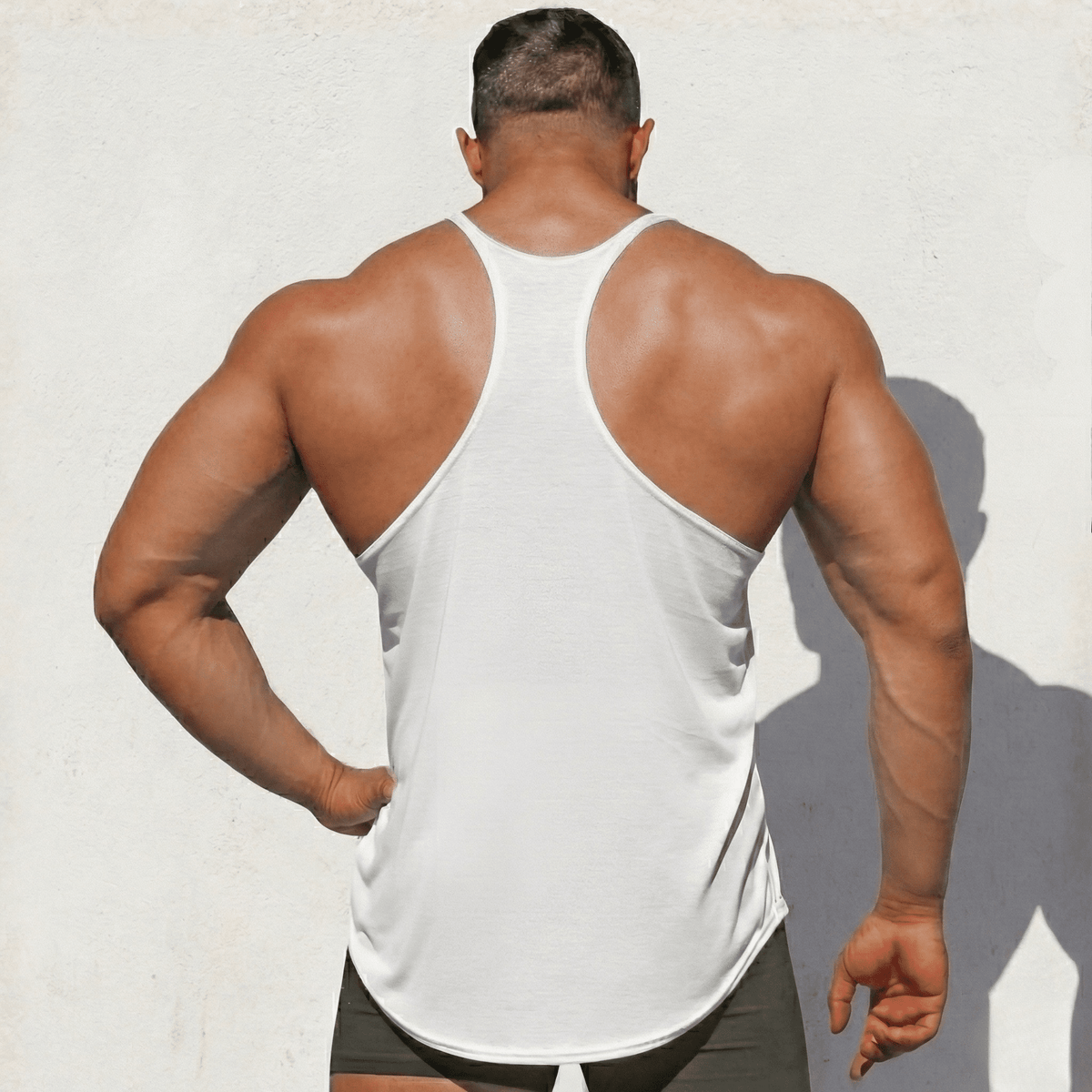 White stringer tank top, racerback back view with curved hem and side seams