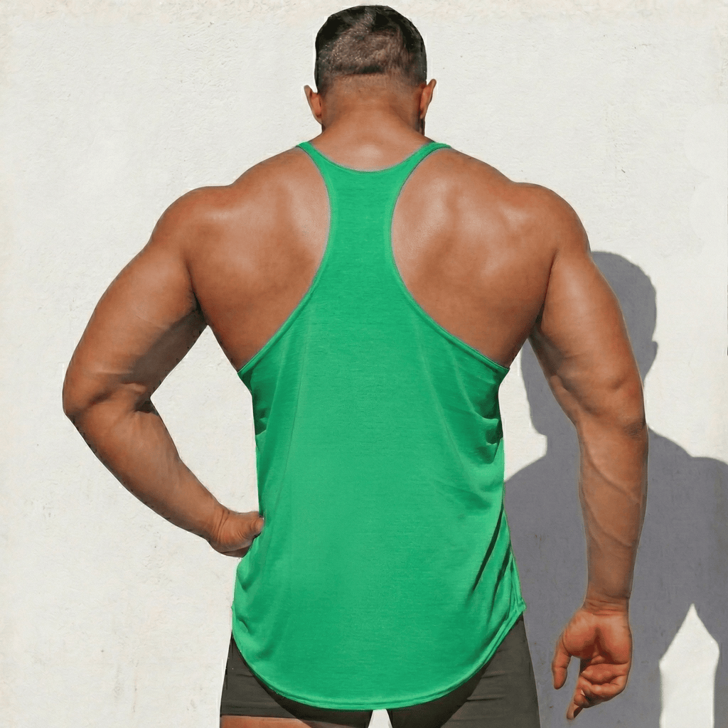 Green stringer tank top viewed from back, wide racerback straps and hem