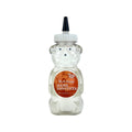 Bear-shaped hand sanitizer bottle, clear plastic with Blood Orange label