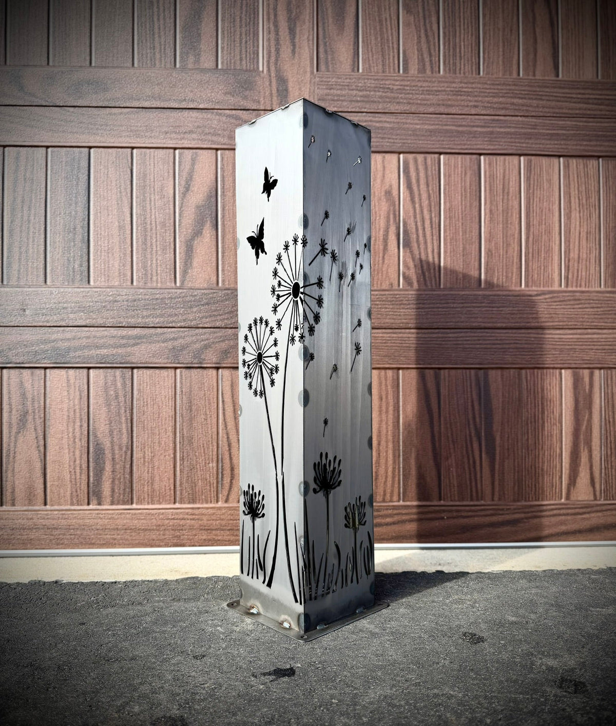Solar steel luminary pillar light with black dandelion and butterfly cutout art