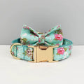 Teal floral dog collar with gold hardware and matching fabric bow