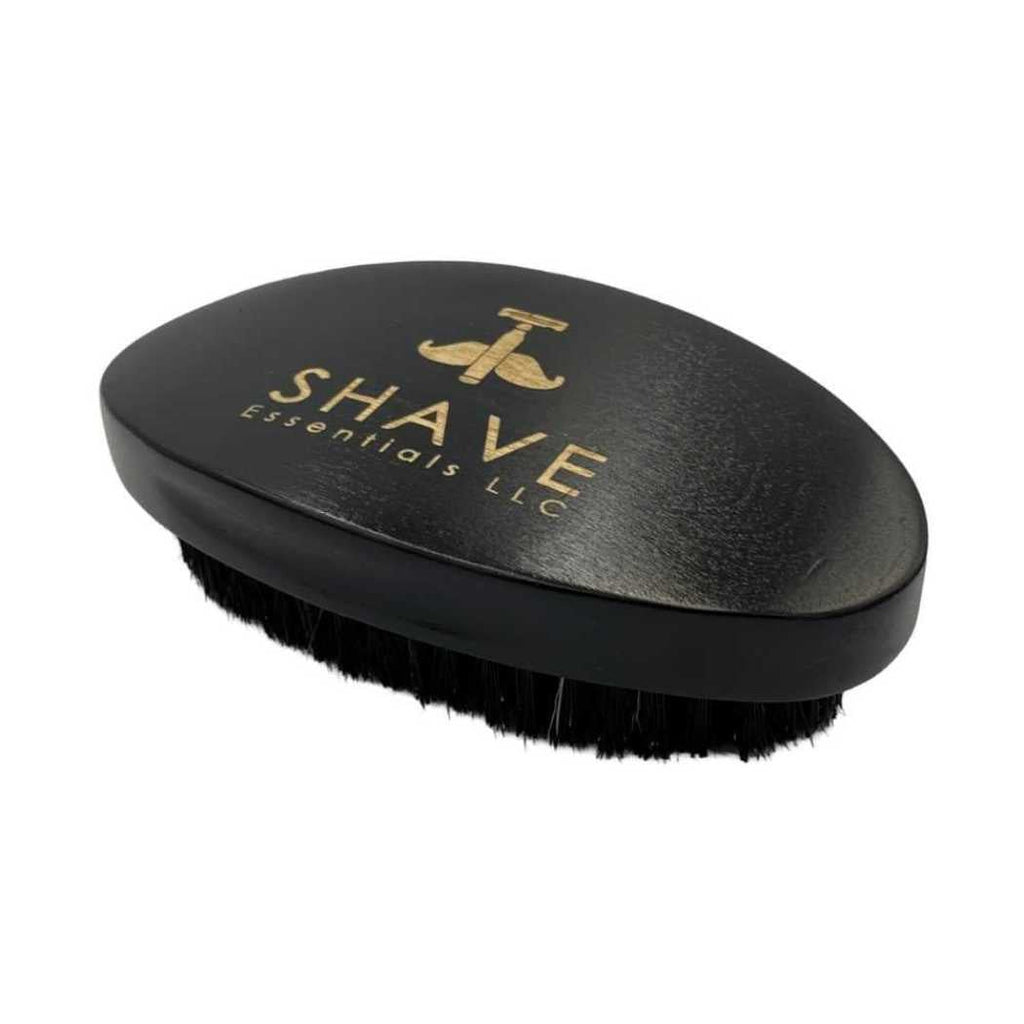 Black beard brush with black bristles and SHAVE ESSENTIALS logo