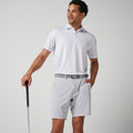 Light patterned performance polo shirt with short sleeves and button-up collar