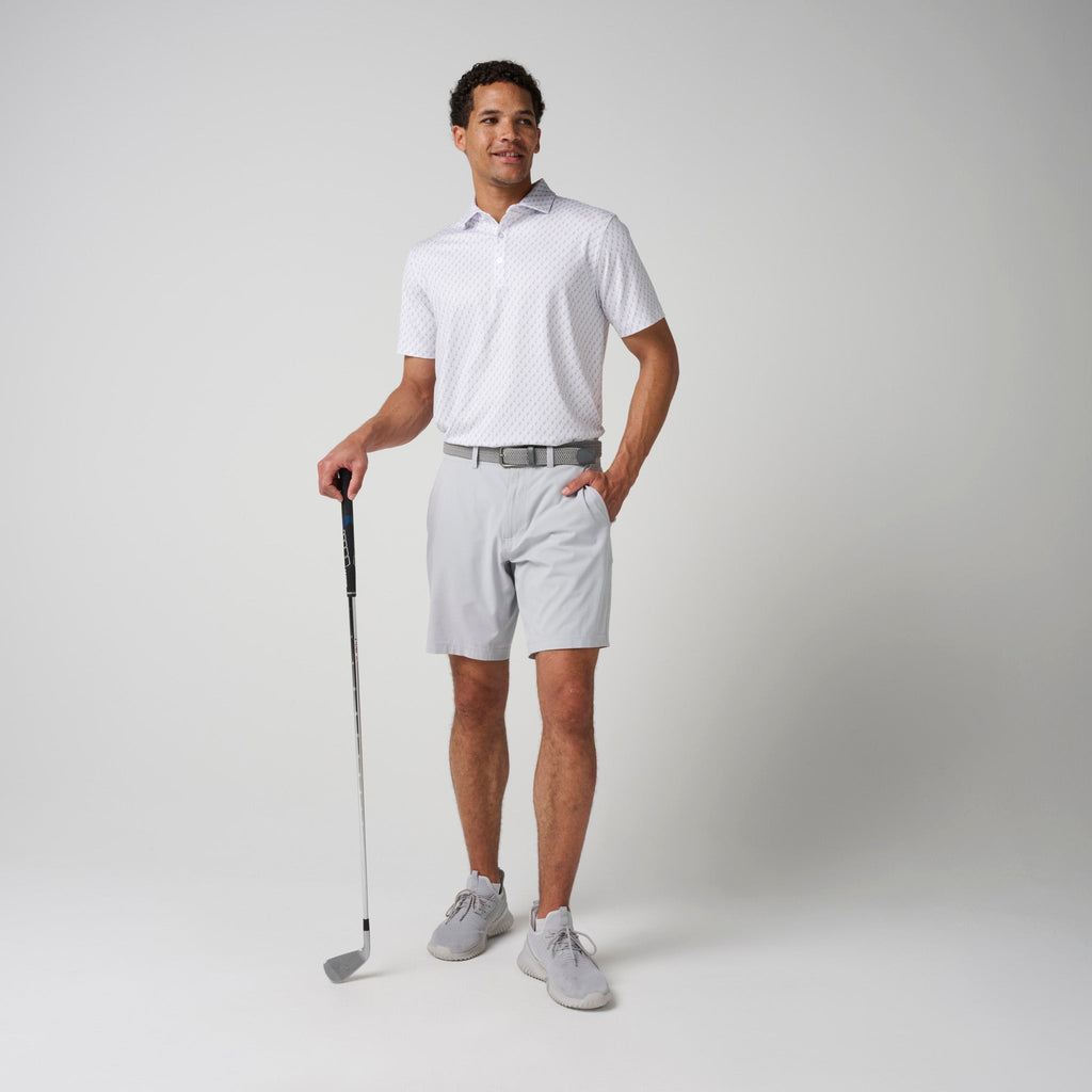 Light patterned polo shirt with button-up collar and short sleeves, full body