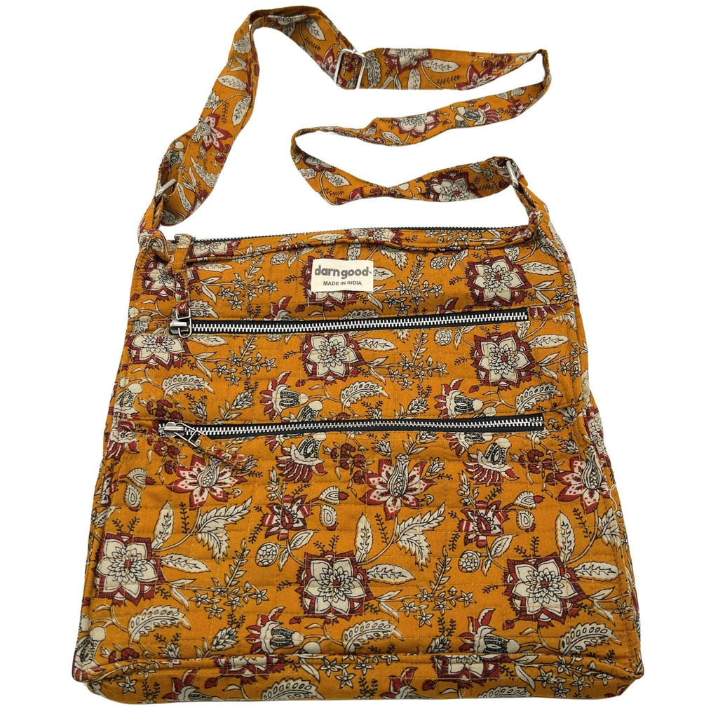 Boho crossbody bag with orange floral print and three zippered front rows
