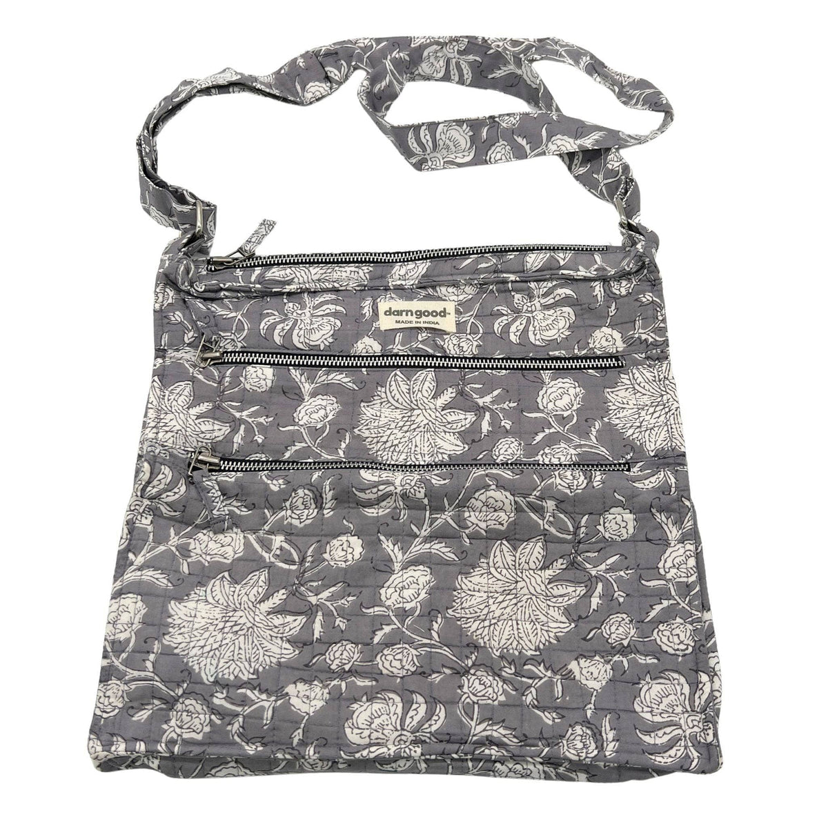 Boho crossbody bag with gray floral pattern and three zippered front rows