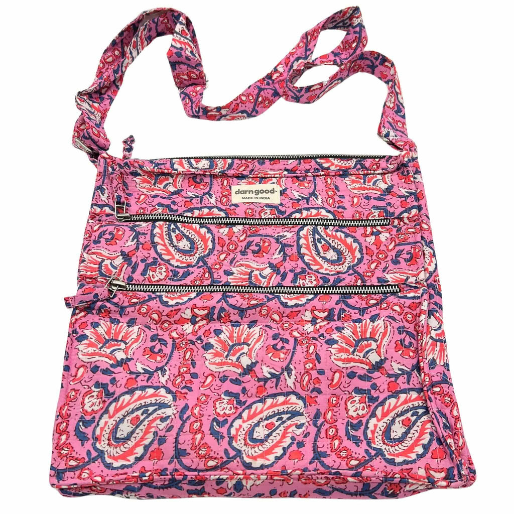Bold paisley print crossbody bag in pink and blue with top zip closure