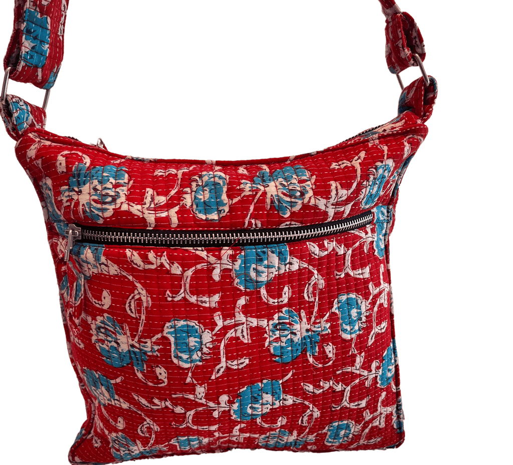 Boho patchwork crossbody bag in red with white zipper and allover music-note pattern