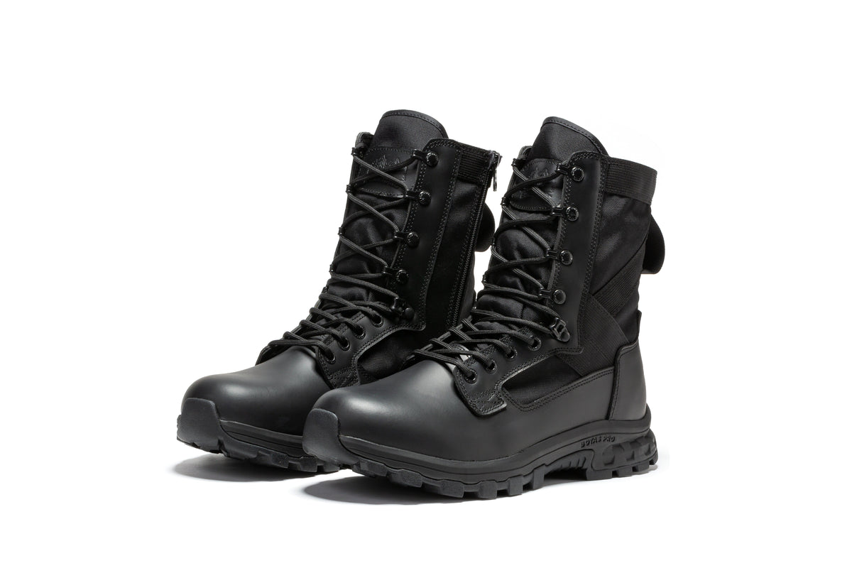 Pair of black tactical boots with lace-up fronts, side zippers, and chunky soles