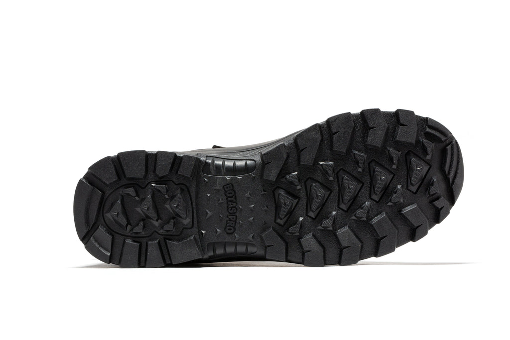 Black tactical boot outsole with deep tread and durable rubber traction pattern