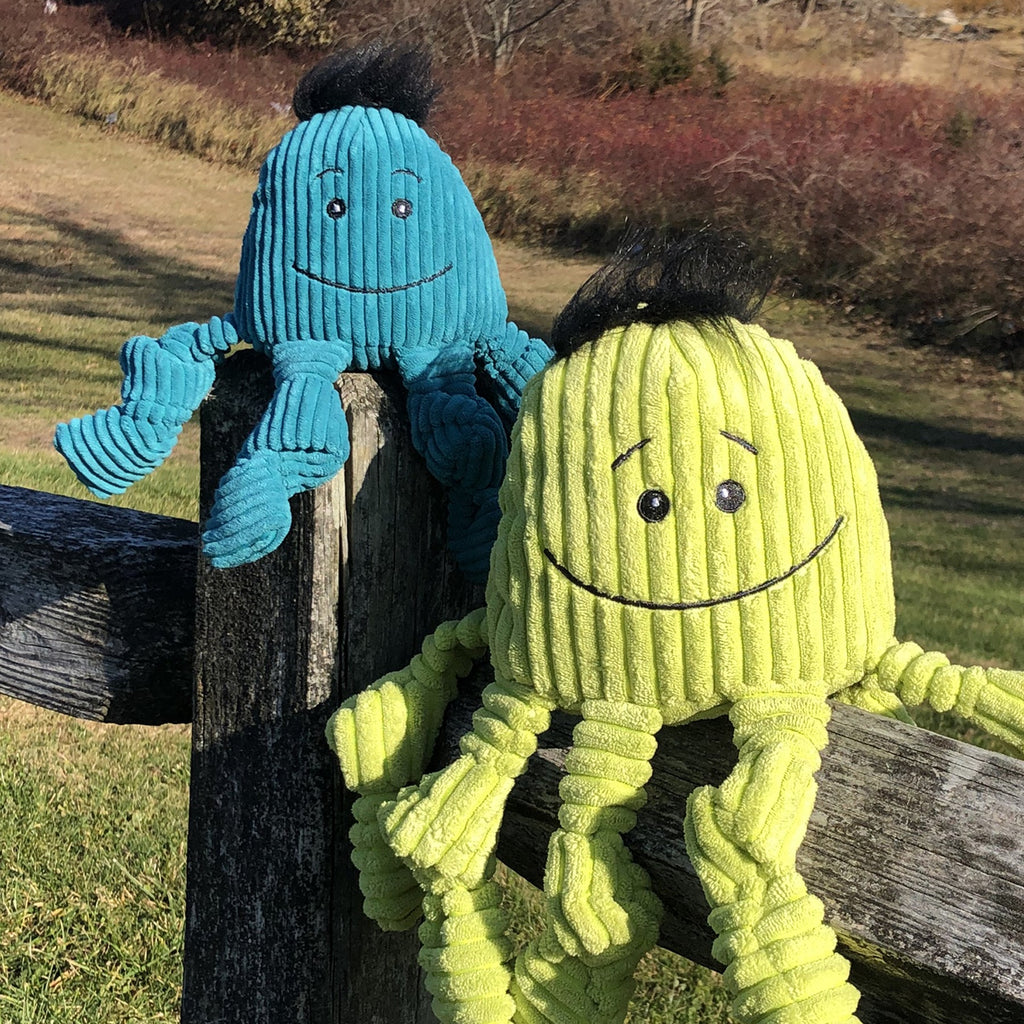 Blue and lime plush octopus dog toys with smiling faces and ribbed tentacles