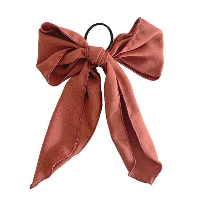 Terracotta rose bowknot hair scrunchie with large bow and ribbon tails.