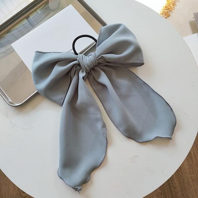 Light blue satin bow hair scrunchie with elastic hair band