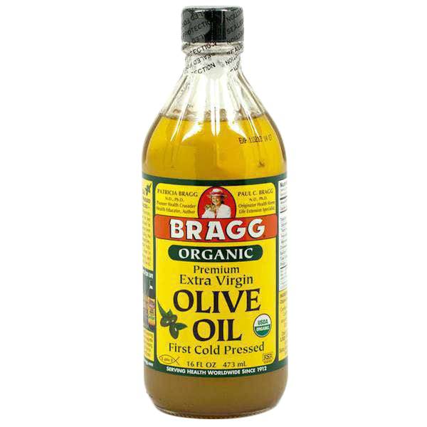 Bragg Organic extra virgin olive oil bottle, first cold pressed label