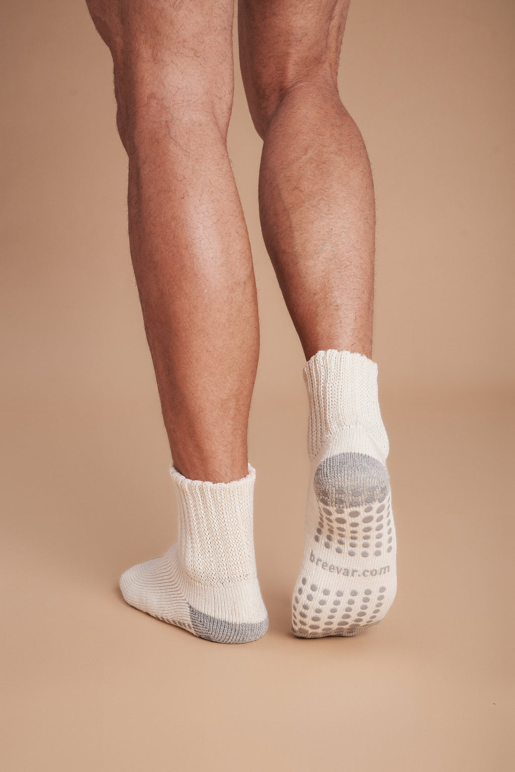Men's crew socks, off-white with gray cushioning and non-slip dotted sole