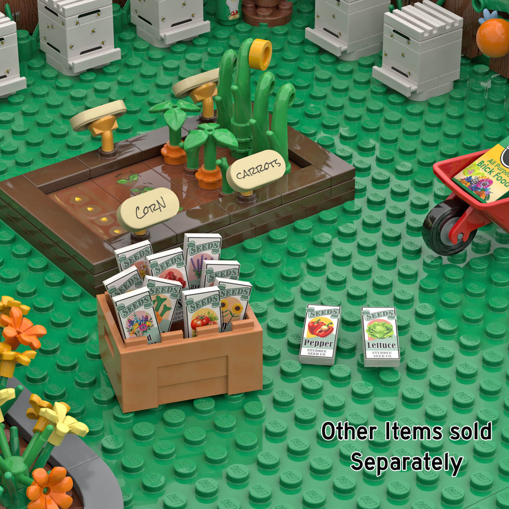 LEGO minifig seed display with carrot packet on green studded base.