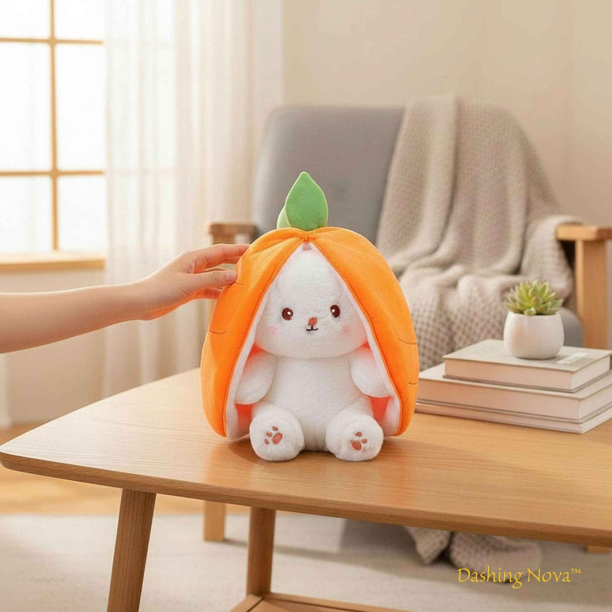 Reversible bunny plush toy with orange carrot-style hood and green leaf top