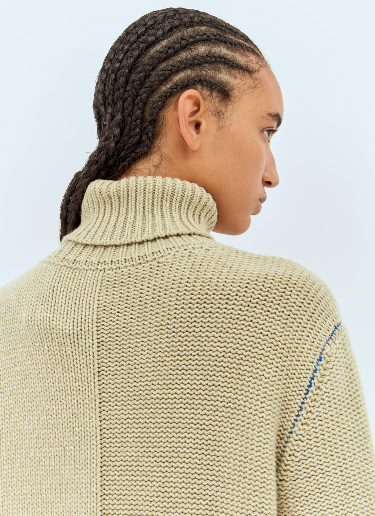 Women’s cream cashmere sweater with ribbed high turtleneck and textured knit back
