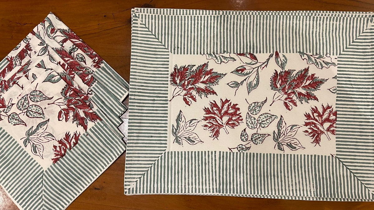 Cotton table linen runner with burgundy leaf print and slate blue striped border