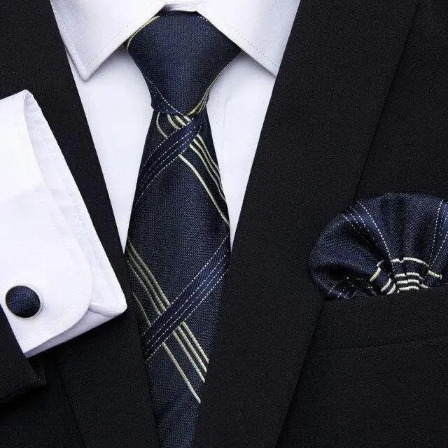 Navy textured stripe silk tie and matching pocket square with black jacket and shirt cufflinks