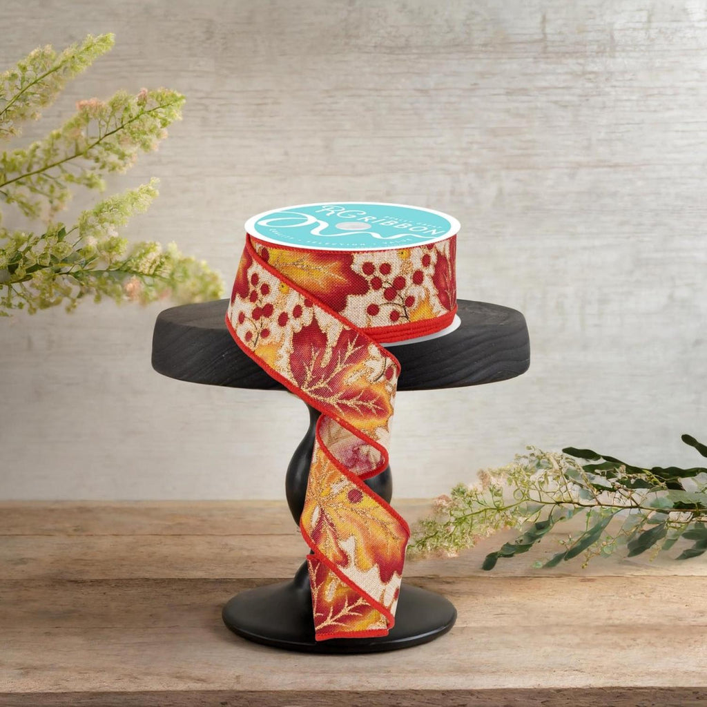 1.5-inch decorative ribbon spool with red berry and gold leaf print, ribbon looped