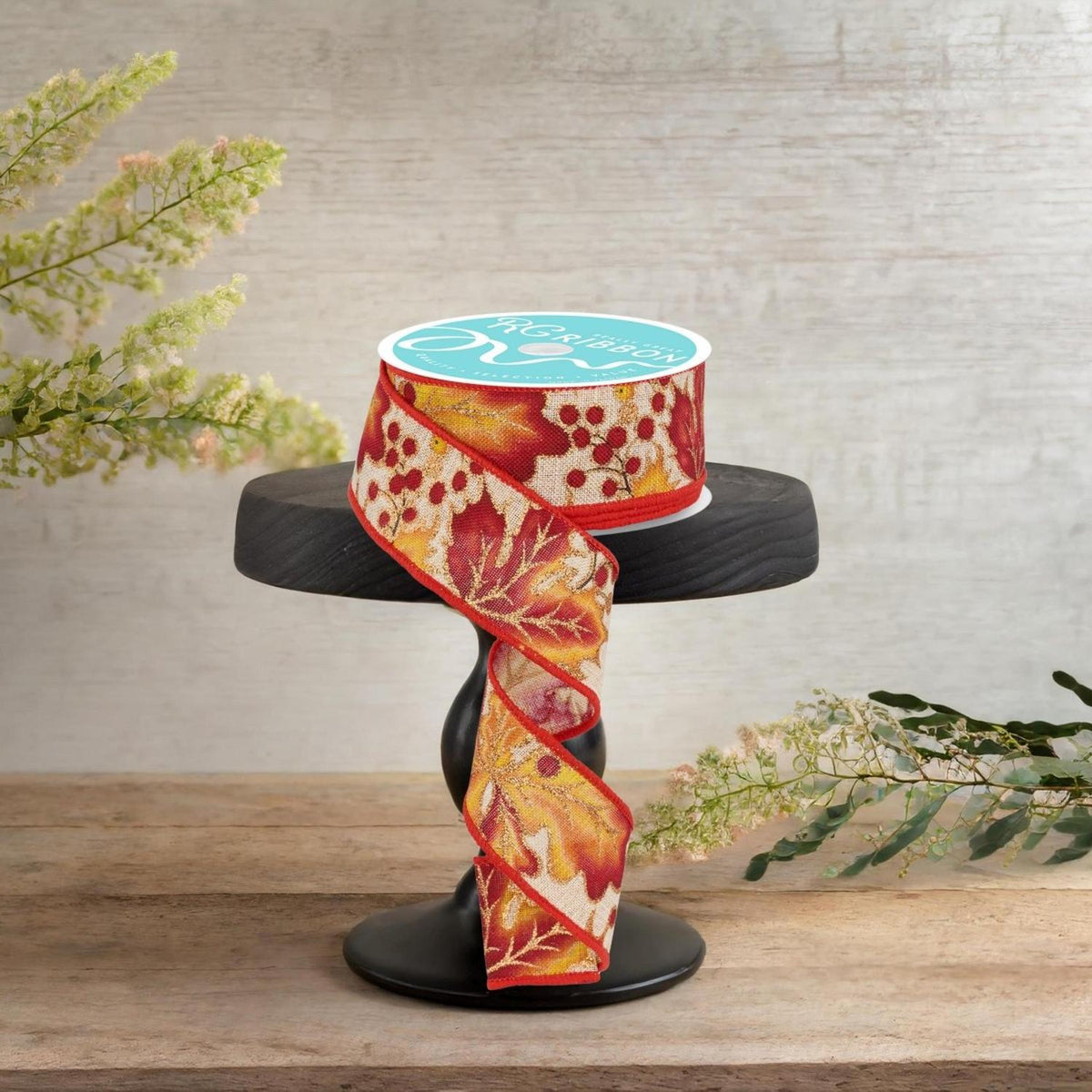 1.5-inch decorative ribbon spool with red berry and gold leaf print, ribbon looped