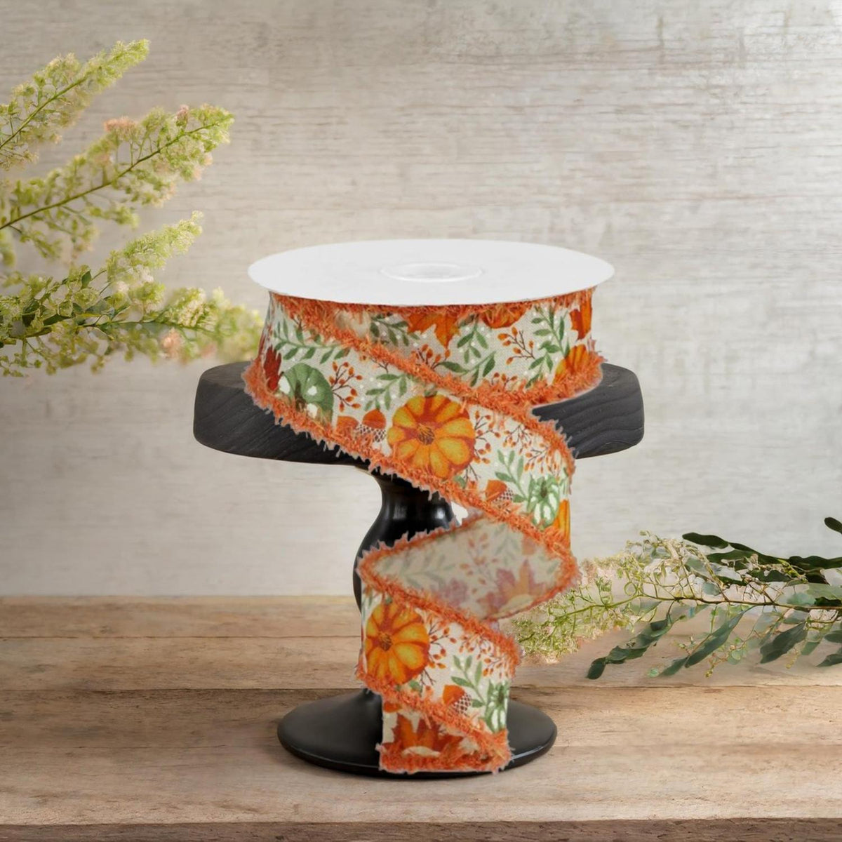 Pumpkin foliage ribbon on spool, orange pumpkin and leaf print with scalloped fray