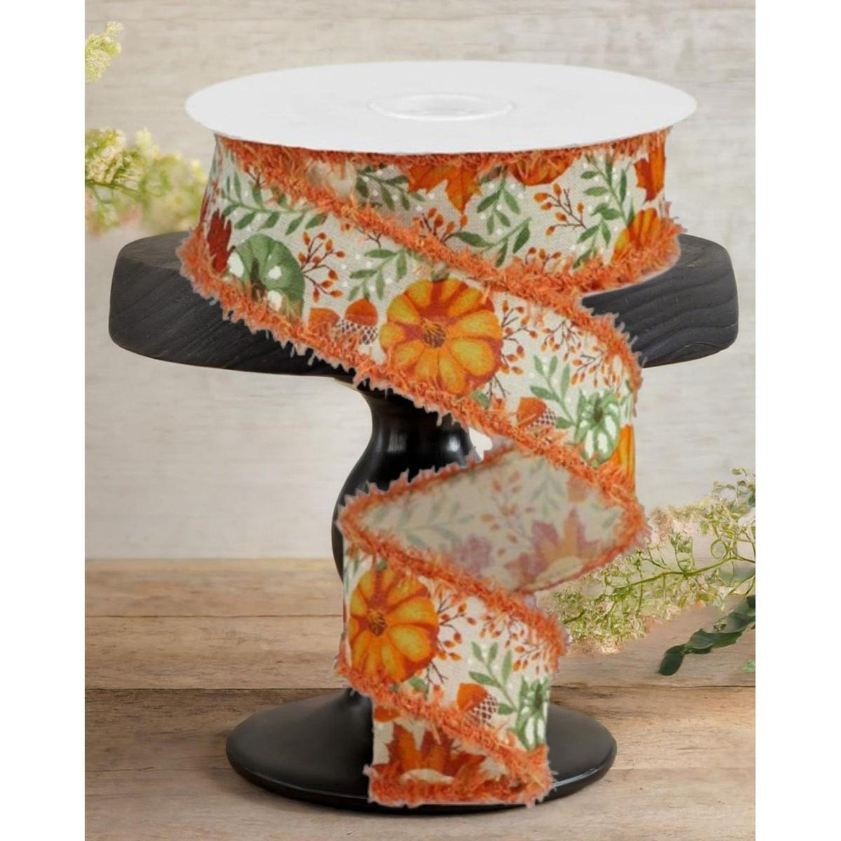Printed pumpkin foliage ribbon roll, orange and green florals on cream with frayed trim